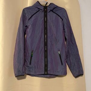 Women’s size Large rain/wind breaker jacket.